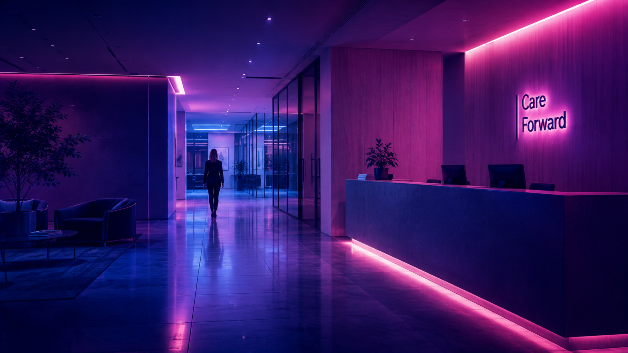 Reception area bathed in pink/purple neon light with a 'Care Forward' sign on the wall; a person walks toward a glass-walled corridor.