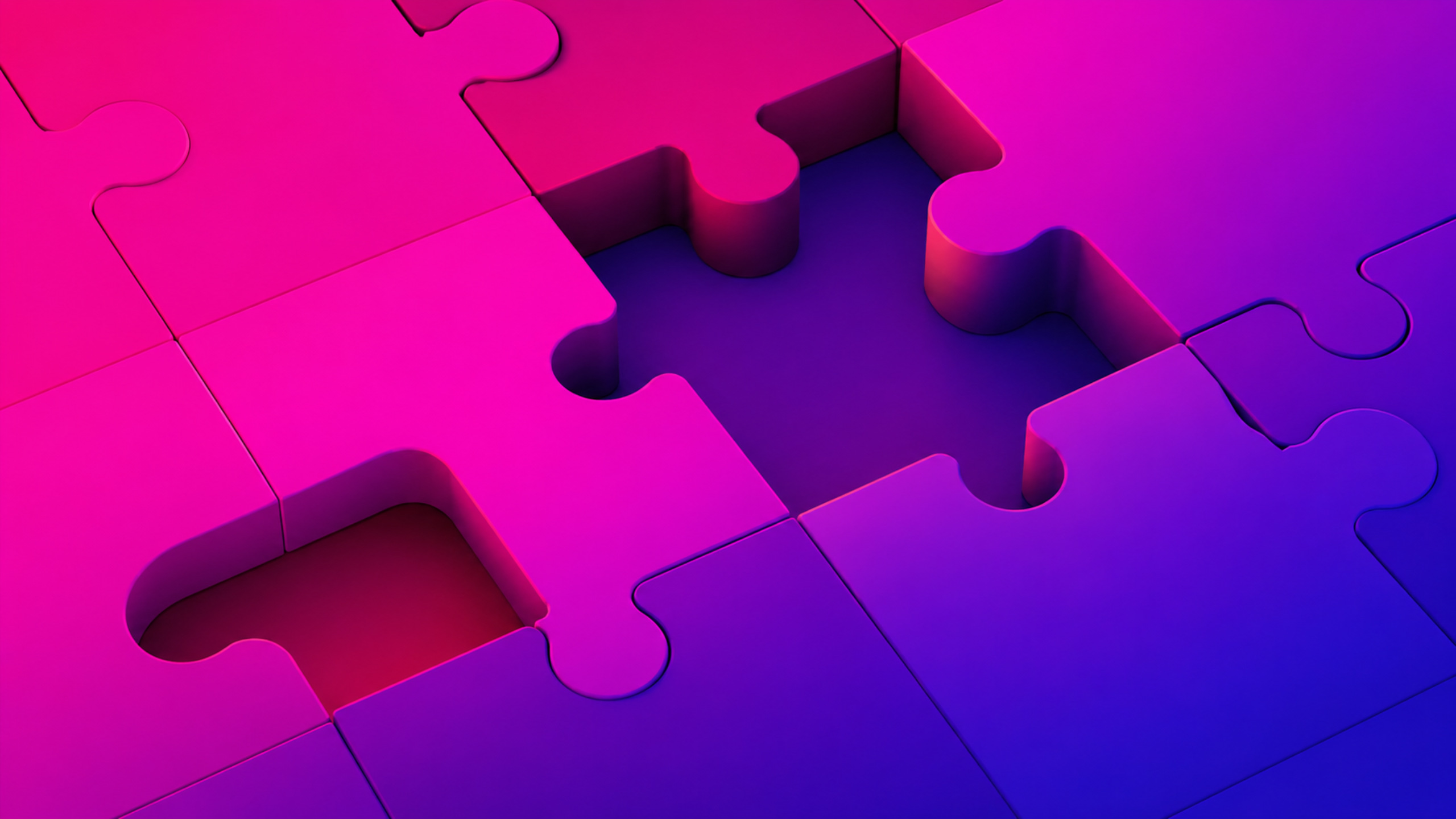 Close-up of pink and purple interlocking puzzle pieces with gaps between them, lit with a gradient glow.